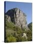 Rock of Castellane Towering Above a Small House-Chris Hellier-Stretched Canvas