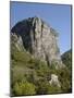 Rock of Castellane Towering Above a Small House-Chris Hellier-Mounted Photographic Print