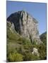 Rock of Castellane Towering Above a Small House-Chris Hellier-Mounted Photographic Print