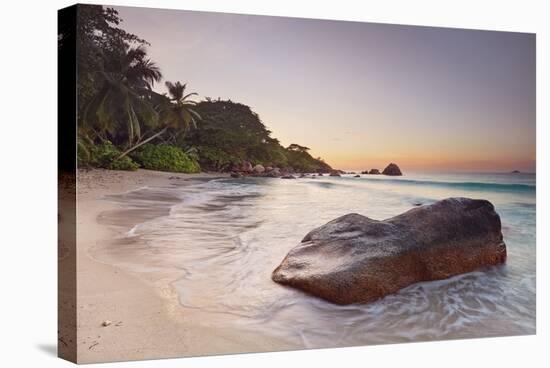 Rock on the Anse Lazio beach, Praslin Island, Seychelles-null-Stretched Canvas