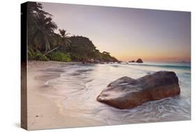 Rock on the Anse Lazio beach, Praslin Island, Seychelles-null-Stretched Canvas