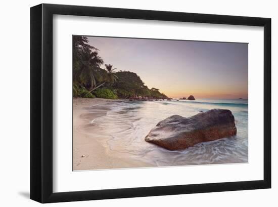Rock on the Anse Lazio beach, Praslin Island, Seychelles-null-Framed Art Print