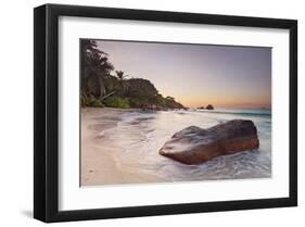 Rock on the Anse Lazio beach, Praslin Island, Seychelles-null-Framed Art Print