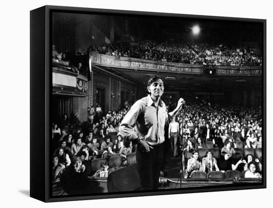 Rock Promoter Bill Graham Onstage with Audience Visible, at Fillmore East-John Olson-Framed Stretched Canvas