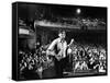 Rock Promoter Bill Graham Onstage with Audience Visible, at Fillmore East-John Olson-Framed Stretched Canvas