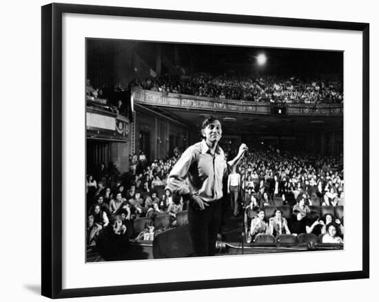 Rock Promoter Bill Graham Onstage with Audience Visible, at Fillmore East-John Olson-Framed Premium Photographic Print