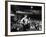 Rock Promoter Bill Graham Onstage with Audience Visible, at Fillmore East-John Olson-Framed Premium Photographic Print