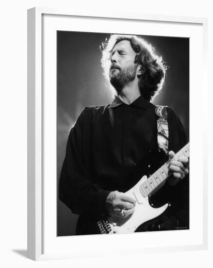 Rock Star Eric Clapton Playing His Guitar in Concert at the Meadowlands Arena-null-Framed Premium Photographic Print