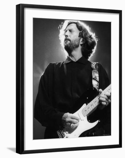 Rock Star Eric Clapton Playing His Guitar in Concert at the Meadowlands Arena-null-Framed Premium Photographic Print