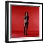 Rock Star Jim Morrison of the Doors Holding Microphone Alone as He Stands Against a Red Backdrop-Yale Joel-Framed Premium Photographic Print