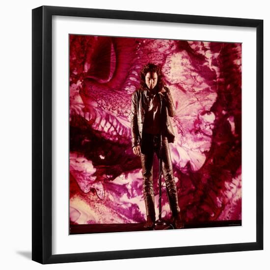 Rock Star Jim Morrison of The Doors Singing on Stage in Front of a Purple Psychedelic Backdrop-Yale Joel-Framed Premium Photographic Print