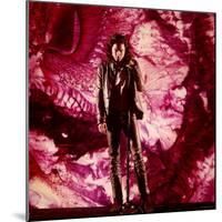 Rock Star Jim Morrison of The Doors Singing on Stage in Front of a Purple Psychedelic Backdrop-Yale Joel-Mounted Premium Photographic Print