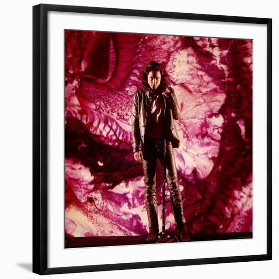 Rock Star Jim Morrison of The Doors Singing on Stage in Front of a Purple Psychedelic Backdrop-Yale Joel-Framed Premium Photographic Print