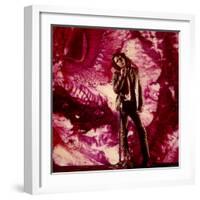 Rock Star Jim Morrison of the Doors Standing Alone in Front of a Purple Psychedelic Backdrop-Yale Joel-Framed Premium Photographic Print