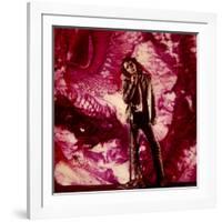 Rock Star Jim Morrison of the Doors Standing Alone in Front of a Purple Psychedelic Backdrop-Yale Joel-Framed Premium Photographic Print