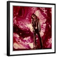 Rock Star Jim Morrison of the Doors Standing Alone in Front of a Purple Psychedelic Backdrop-Yale Joel-Framed Premium Photographic Print