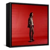 Rock Star Jim Morrison of the Doors Standing Alone Next to Microphone in Front of a Red Backdrop-Yale Joel-Framed Stretched Canvas