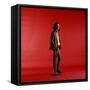 Rock Star Jim Morrison of the Doors Standing Alone Next to Microphone in Front of a Red Backdrop-Yale Joel-Framed Stretched Canvas