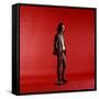 Rock Star Jim Morrison of the Doors Standing Alone Next to Microphone in Front of a Red Backdrop-Yale Joel-Framed Stretched Canvas