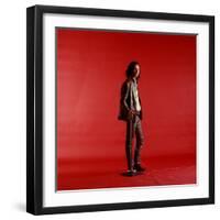 Rock Star Jim Morrison of the Doors Standing Alone Next to Microphone in Front of a Red Backdrop-Yale Joel-Framed Premium Photographic Print