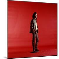Rock Star Jim Morrison of the Doors Standing Alone Next to Microphone in Front of a Red Backdrop-Yale Joel-Mounted Premium Photographic Print
