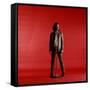 Rock Star Jim Morrison of the Doors Standing Behind Microphone Alone Against a Red Backdrop-Yale Joel-Framed Stretched Canvas