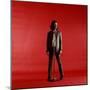 Rock Star Jim Morrison of the Doors Standing Behind Microphone Alone Against a Red Backdrop-Yale Joel-Mounted Premium Photographic Print