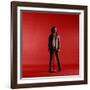 Rock Star Jim Morrison of the Doors Standing Behind Microphone Alone Against a Red Backdrop-Yale Joel-Framed Premium Photographic Print