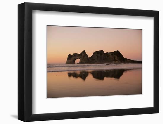 Rock with a Hole in Sunset-null-Framed Art Print