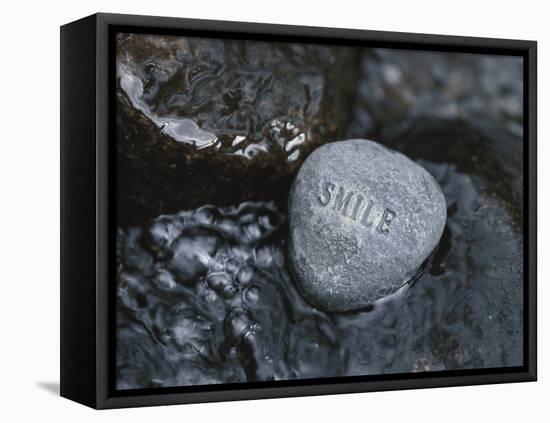 Rock with the Word Smile in Rushing Water-null-Framed Stretched Canvas