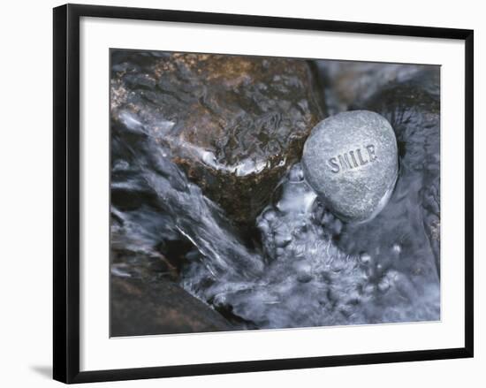 Rock with the Word Smile in Rushing Water-null-Framed Photographic Print