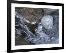 Rock with the Word Smile in Rushing Water-null-Framed Photographic Print