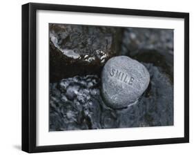 Rock with the Word Smile in Rushing Water-null-Framed Photographic Print