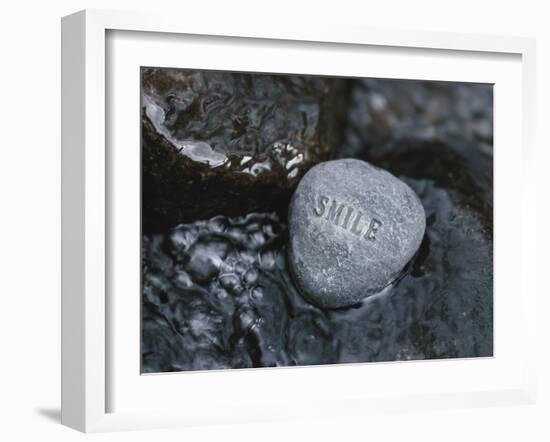 Rock with the Word Smile in Rushing Water-null-Framed Photographic Print