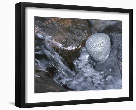 Rock with the Word Smile in Rushing Water-null-Framed Photographic Print