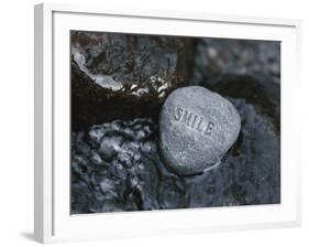 Rock with the Word Smile in Rushing Water-null-Framed Photographic Print