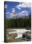 Rocks and Trees Beside a River with the Rocky Mountains in the Background, British Columbia, Canada-Harding Robert-Stretched Canvas