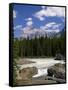 Rocks and Trees Beside a River with the Rocky Mountains in the Background, British Columbia, Canada-Harding Robert-Framed Stretched Canvas