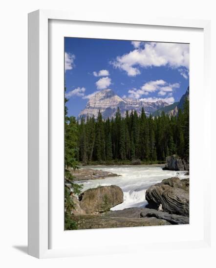 Rocks and Trees Beside a River with the Rocky Mountains in the Background, British Columbia, Canada-Harding Robert-Framed Photographic Print
