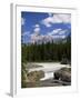 Rocks and Trees Beside a River with the Rocky Mountains in the Background, British Columbia, Canada-Harding Robert-Framed Photographic Print