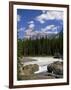 Rocks and Trees Beside a River with the Rocky Mountains in the Background, British Columbia, Canada-Harding Robert-Framed Photographic Print