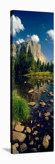 Rocks in a Lake with Mountain in the Background-null-Stretched Canvas