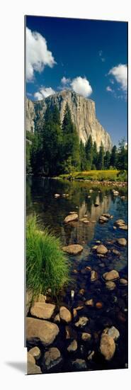 Rocks in a Lake with Mountain in the Background-null-Mounted Photographic Print