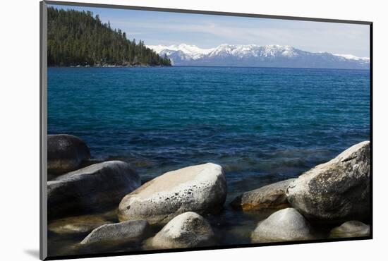 Rocks in a lake with mountain range in the background, Lake Tahoe, California, USA-Panoramic Images-Mounted Photographic Print