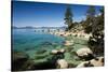 Rocks in a lake with mountain range in the background, Lake Tahoe, California, USA-Panoramic Images-Stretched Canvas