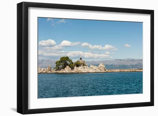 Rocks the Harbour Wall and a Statue of the Madonna in the Harbour at Trpanj Croatia-Julian Eales-Framed Photographic Print