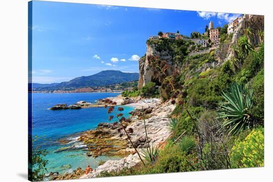 Rocky Coast with View of Menton in France near Ventimiglia, Province of Imperia, Liguria, Italy-null-Stretched Canvas