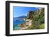 Rocky Coast with View of Menton in France near Ventimiglia, Province of Imperia, Liguria, Italy-null-Framed Art Print