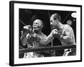 Rocky Marciano Landing a Punch on Jersey Joe Walcott, Sept. 23, 1952-null-Framed Photo