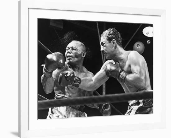 Rocky Marciano Landing a Punch on Jersey Joe Walcott, Sept. 23, 1952-null-Framed Photo